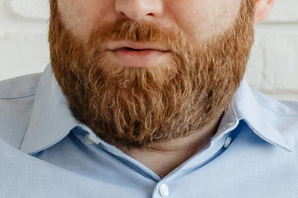 half face of bearded man